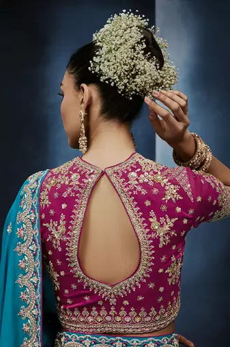 Aqua blue fancy fabric embroidered saree with stiched blouse