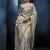 Light grey fancy fabric embroidered saree with stiched blouse