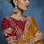 Orange fancy fabric embroidered saree with stiched blouse