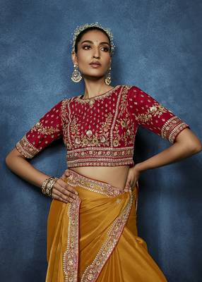 Orange fancy fabric embroidered saree with stiched blouse 4