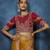 Orange fancy fabric embroidered saree with stiched blouse