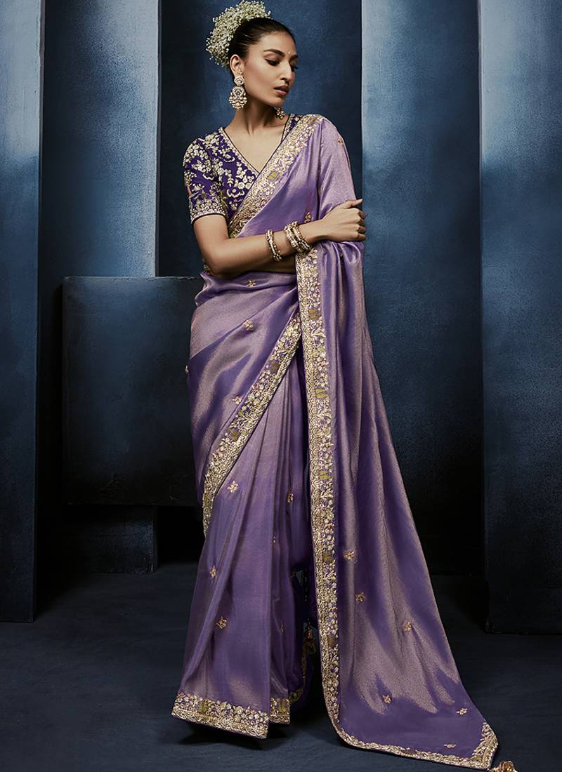 Lavender fancy fabric embroidered saree with stiched blouse