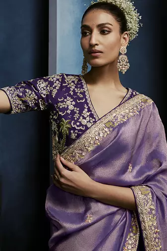 Lavender fancy fabric embroidered saree with stiched blouse