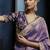 Lavender fancy fabric embroidered saree with stiched blouse