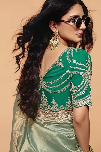Sea green faux organza satin saree with embroidery