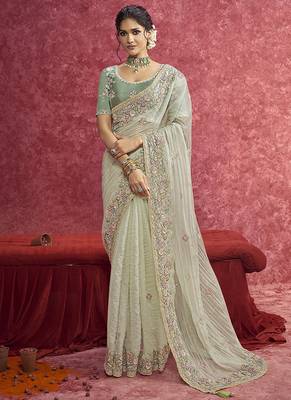 Pista green faux tissue embroidered work saree 1