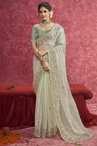 Pista green faux tissue embroidered work saree