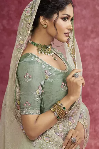 Pista green faux tissue embroidered work saree