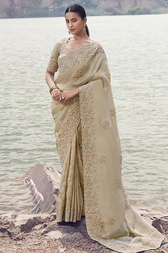 Beige embroidered woven faux tissue silk blend saree