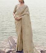 Beige embroidered woven faux tissue silk blend saree