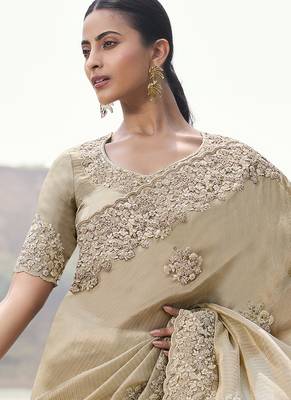 Beige embroidered woven faux tissue silk blend saree 2