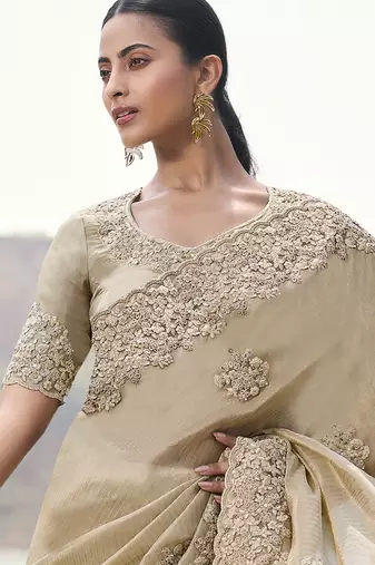 Beige embroidered woven faux tissue silk blend saree
