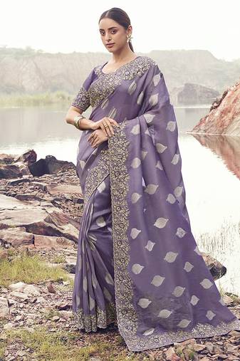 Lavender purple embroidered woven faux tissue silk blend saree