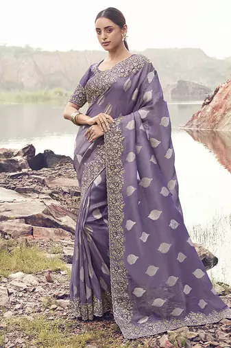 Lavender purple embroidered woven faux tissue silk blend saree