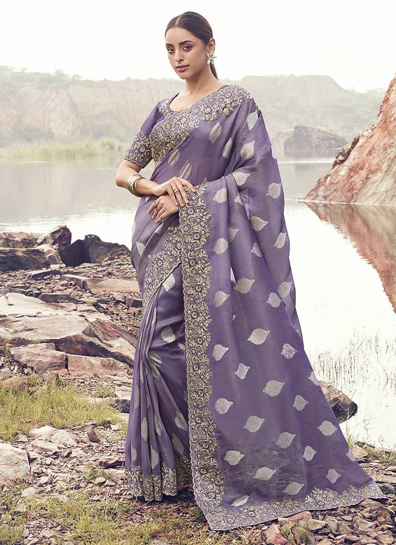 Lavender purple embroidered woven faux tissue silk blend saree