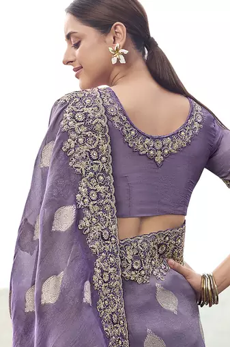 Lavender purple embroidered woven faux tissue silk blend saree