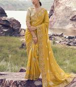 Yellow embroidered woven faux tissue silk blend saree