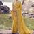 Yellow embroidered woven faux tissue silk blend saree