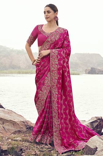 Rani pink embroidered woven satin silk blend saree
