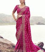 Rani pink embroidered woven satin silk blend saree