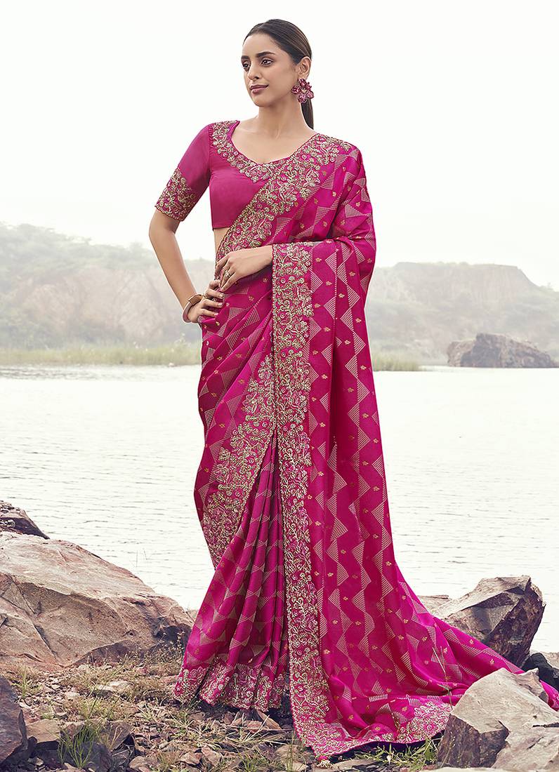 Rani pink embroidered woven satin silk blend saree