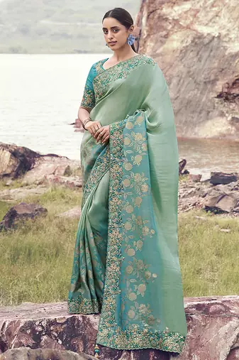 Sea greeen & aqua blue embroidered woven faux tissue silk blend saree