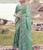 Sea greeen & aqua blue embroidered woven faux tissue silk blend saree