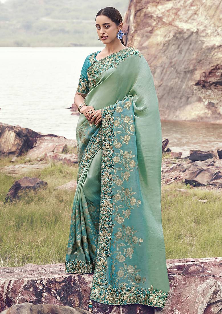 Sea greeen & aqua blue embroidered woven faux tissue silk blend saree