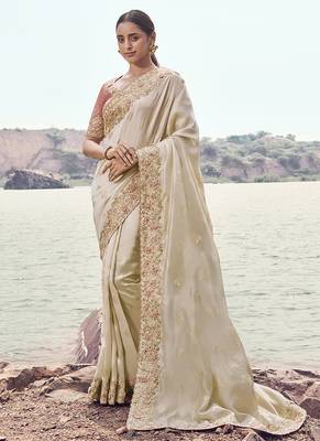 Off white embroidered satin silk blend saree 1