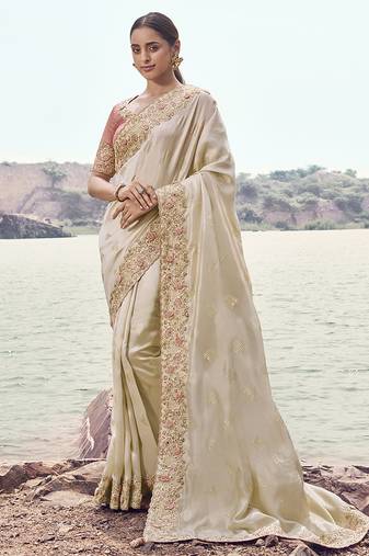 Off white embroidered satin silk blend saree