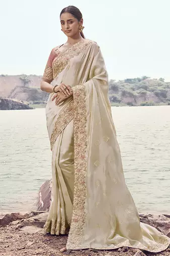 Off white embroidered satin silk blend saree