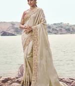 Off white embroidered satin silk blend saree