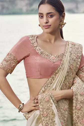 Off white embroidered satin silk blend saree