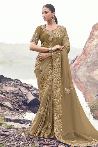 Chiku embroidered banarasi silk blend saree