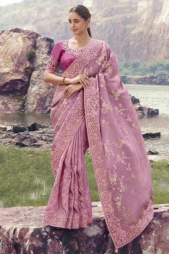Onion pink embroidered woven faux tissue silk blend saree