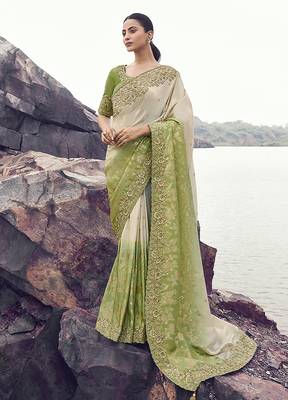 Beige & green embroidered woven faux tissue silk blend saree 1