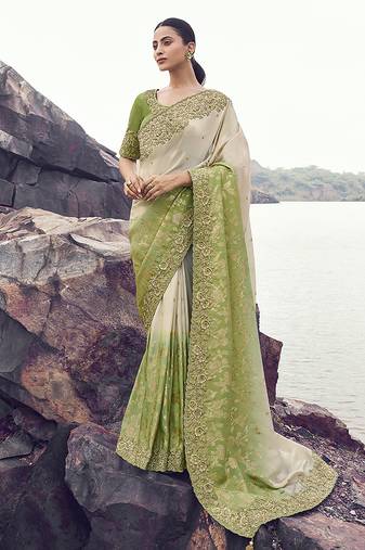Beige & green embroidered woven faux tissue silk blend saree