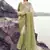 Beige & green embroidered woven faux tissue silk blend saree