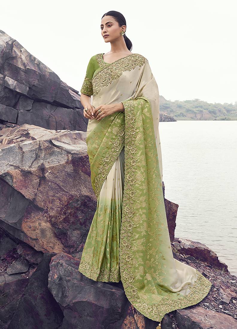 Beige & green embroidered woven faux tissue silk blend saree