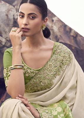 Beige & green embroidered woven faux tissue silk blend saree 2