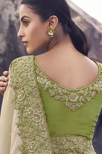 Beige & green embroidered woven faux tissue silk blend saree