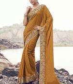 Rust orange embroidered woven satin silk blend saree