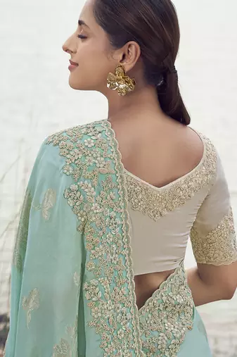 Light sky blue embroidered woven faux tissue silk blend saree