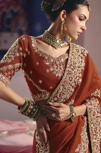 Rust viscose zari tissue silk blend embroidered saree