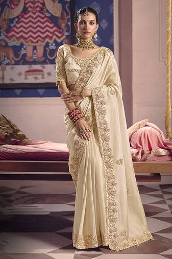 Cream viscose zari tissue silk blend embroidered saree