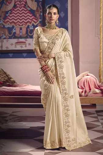 Cream viscose zari tissue silk blend embroidered saree