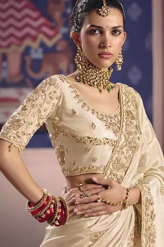 Cream viscose zari tissue silk blend embroidered saree