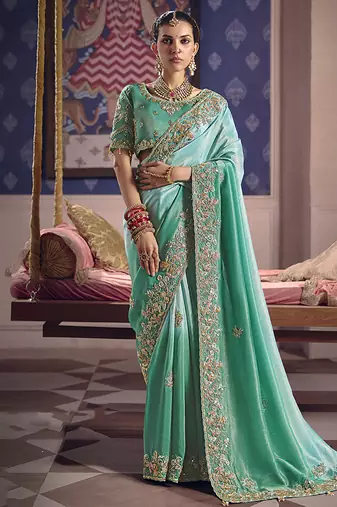 Turquoise viscose zari tissue silk blend embroidered saree