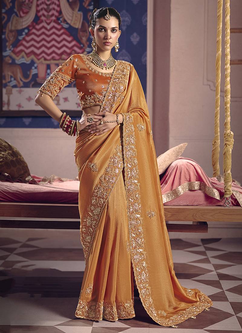 Orange viscose zari tissue silk blend embroidered saree