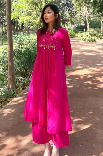 Floral embroidered cotton round neck pink kurta & trouser set
